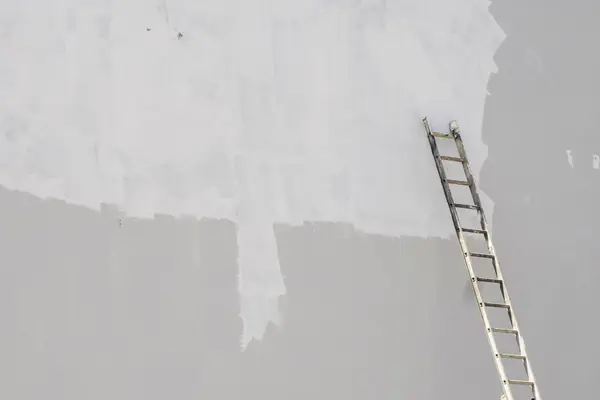 Exterior painting in Allentown: ladder against a freshly primed wall